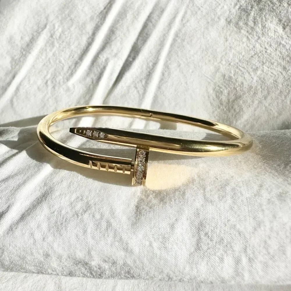 Stainless steel gold color cubic zirconia nail bracelet ￼